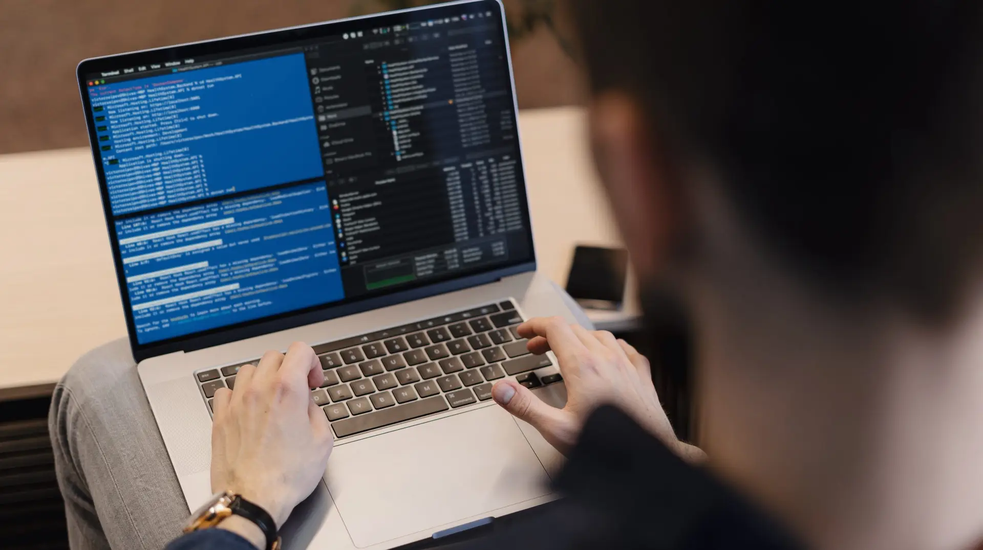 Man coding on computer