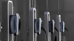 EV charging and electric car, Electric car charging station for charge EV battery, Plug for vehicle with electric engine, EV charger clean energy, Charging point at car parking lot.