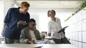 Team of people researching the latest tech news