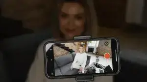 woman recording herself for a youtube video