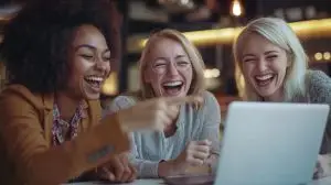 women laughing at a funny social media trend