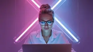 digital-lifestyle-futuristic-technology-virtual-business-curious-smart-confident-woman-with-laptop