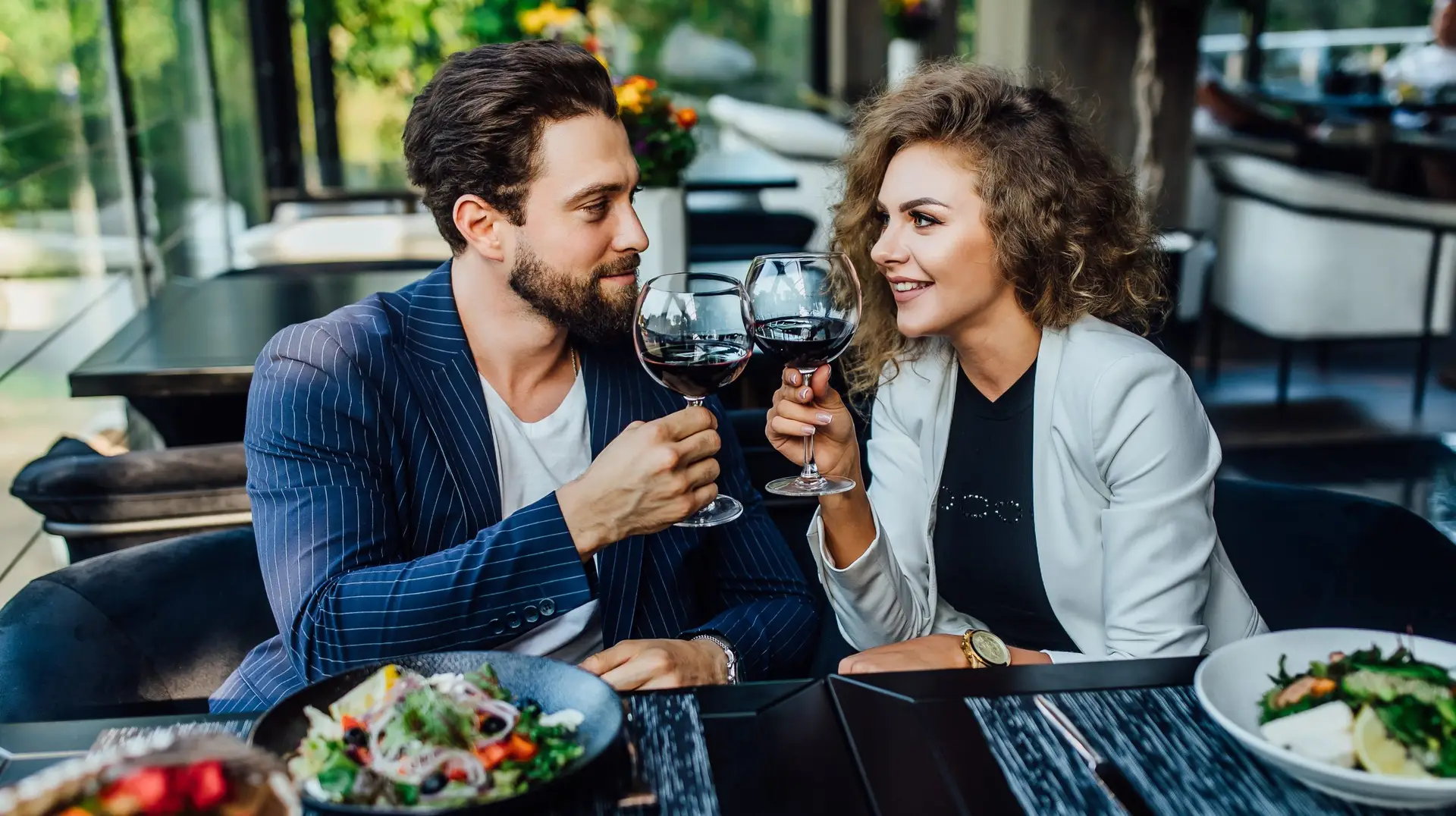 man and woman at a dinner