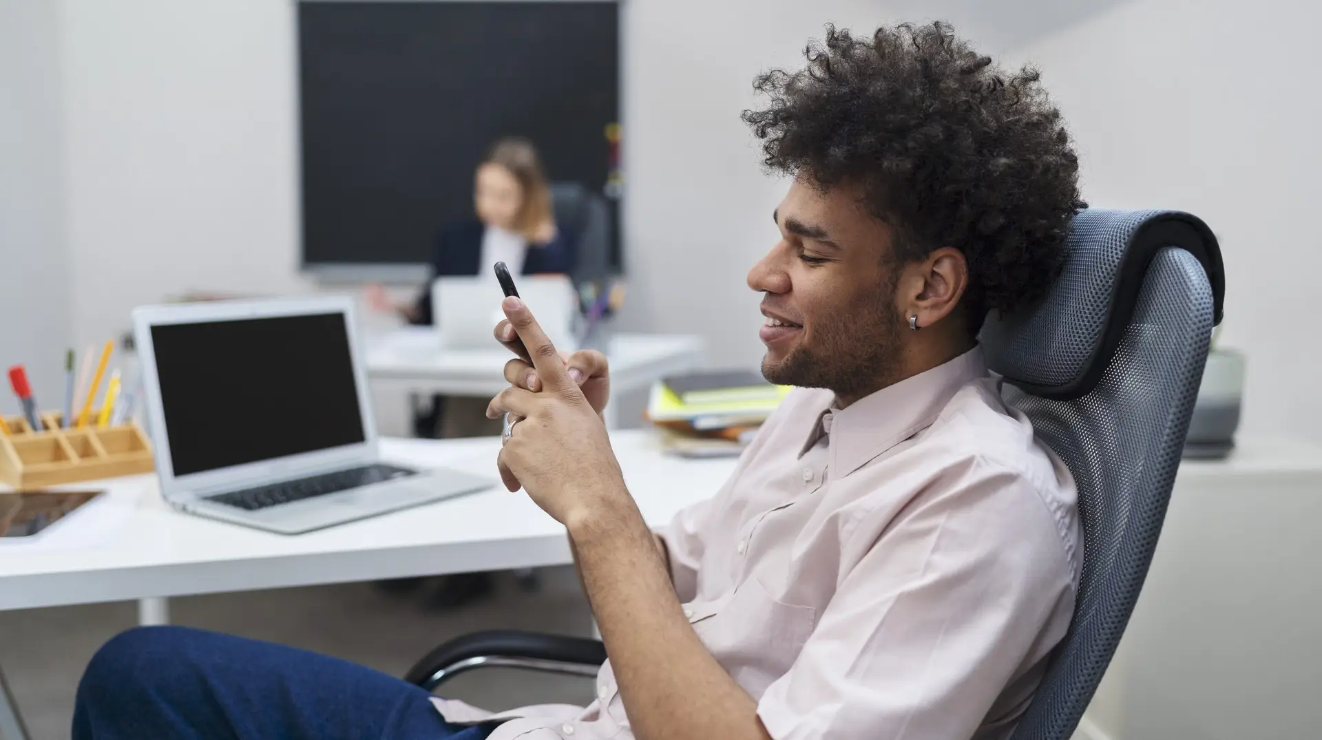 man working on a phone