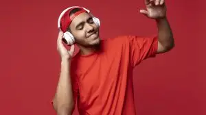 man vibing to music