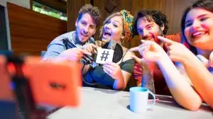 Group,Of,Friends,Conducting,Live,Streaming,Radio,Program,And,Reminding