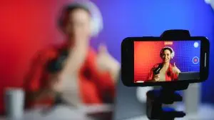 Young,Woman,Blogger,Recording,Video,On,Camera.