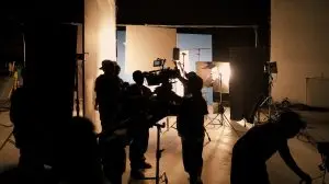 Silhouette,Of,Film,Crews,And,Video,Camera,On,Special,Dolly