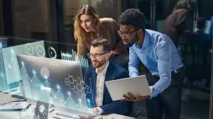 Team,Analyzing,Data,Using,Innovative,Technology,With,Futuristic,Digital,Interfaces