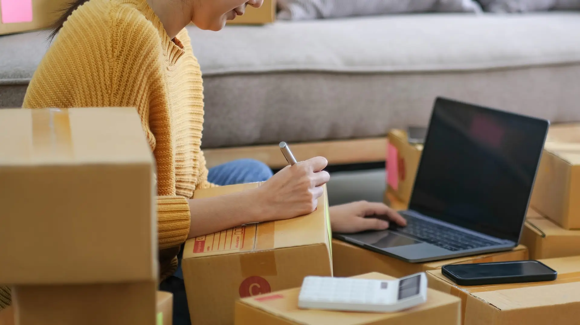 Starting small businesses SME owners female entrepreneurs check online orders to prepare to pack the boxes, sell to customers, sme business ideas online.