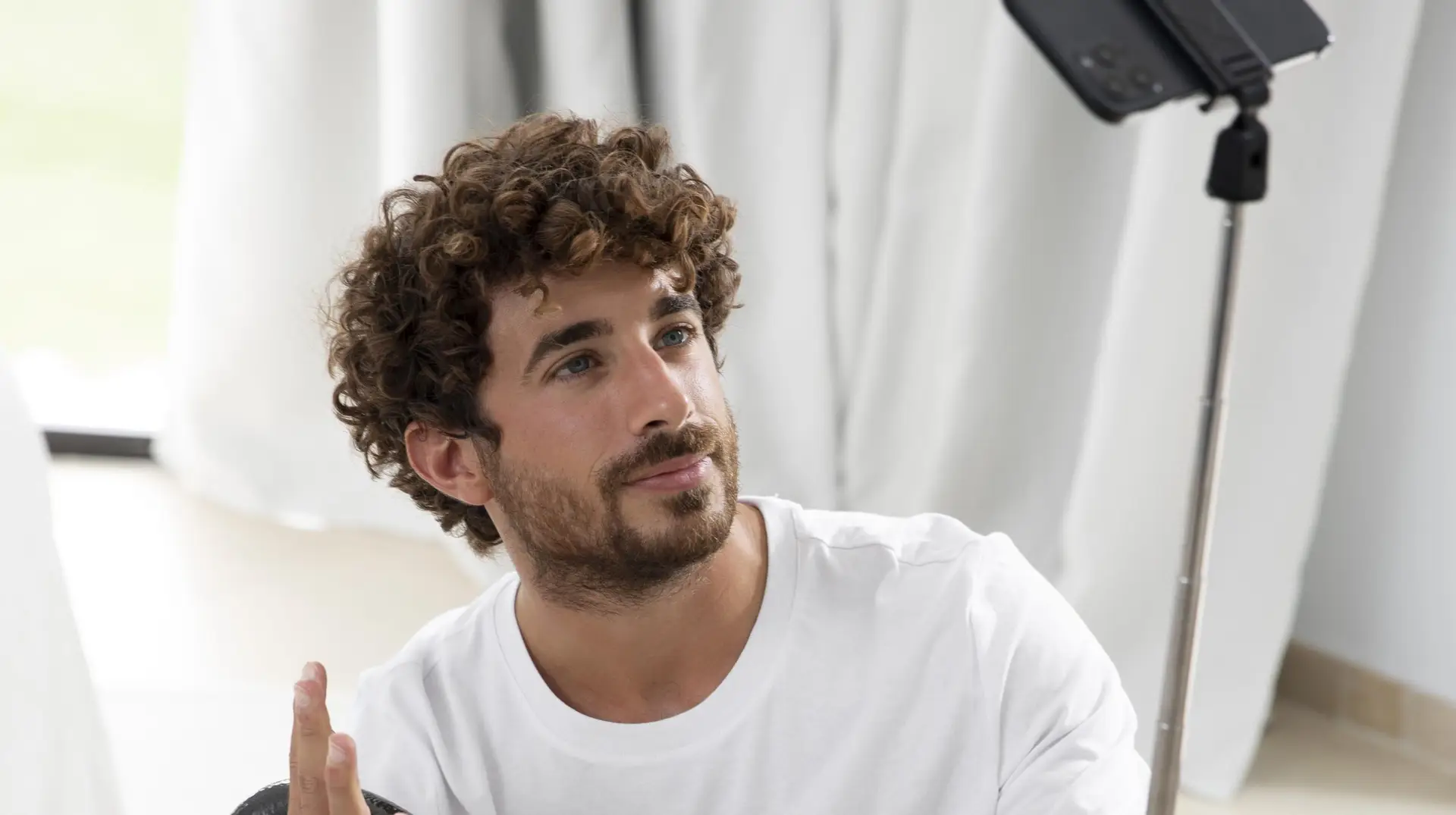 vlogger recording himself on a phone