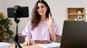 Woman Greeting Her Watchers At Studio