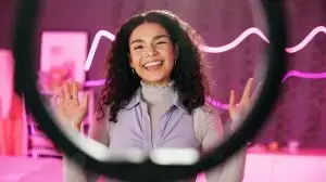 young-woman-talking-with-ring-light-vlog-tutorial-influencer-with-neon-bedroom-female-person-discussion-review-live-stream-podcast-content-creator-with-broadcast-home