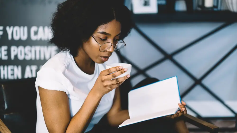 Skilled,Dark,Skinned,Student,Enjoying,Tasty,Coffee,While,Concentrated,On