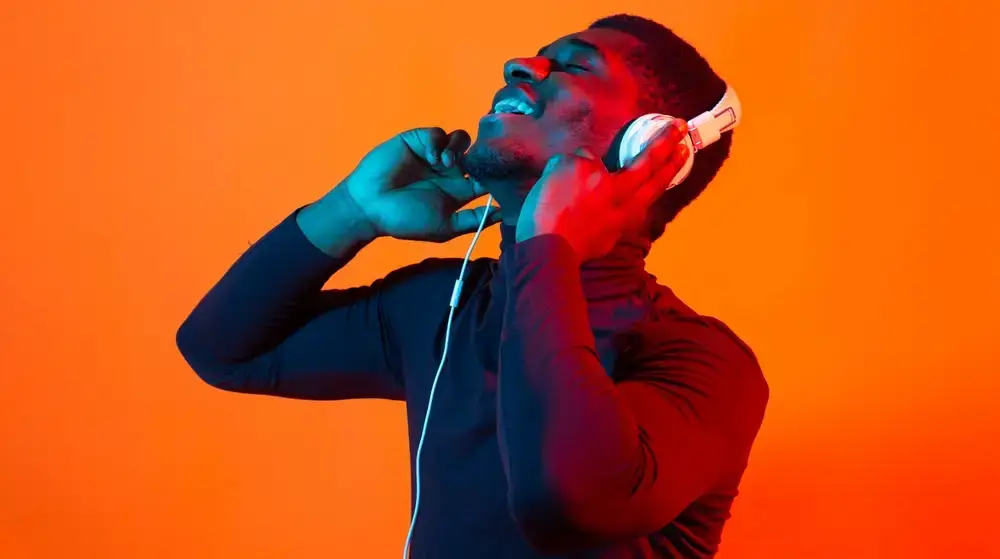 African,American,Young,Man,Listening,To,Music,Online,Dancing,And