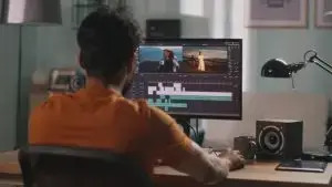 Man,Editing,Video,On,Computer