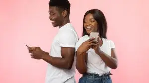 People,And,Technology,Concept.,Portrait,Of,Cheerful,Positive,Black,Couple