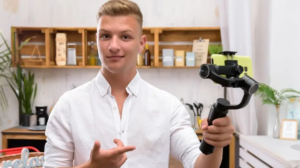 Proud,Self-satisfied,Guy,Filming,A,Video,Blog,On,A,Mobile