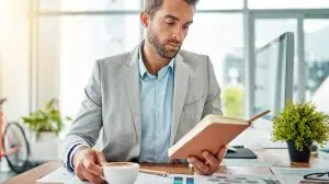 He,Enjoys,His,Breaks,With,A,Book,On,The,Side.