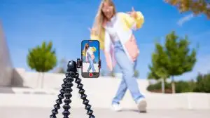 Teenage,Girl,Filming,Video,Of,Herself,On,Mobile,Phone