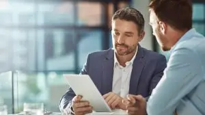 Teamwork,Meeting,,Tablet,And,Business,People,In,Office,Workplace.,Collaboration,