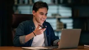 Young,Handsome,Guy,In,Casual,Working,Late,At,Office,,Sitting