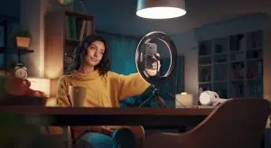 Young,Vlogger,And,Content,Creator,Shooting,A,Video,For,Her