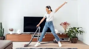 Shot,Of,Young,Happy,Woman,Listening,And,Dancing,To,Music