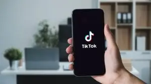 Closed,Up,Image,Of,A,Female,Using,Tiktok,Application,On