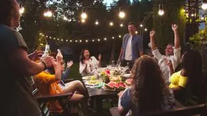 Happy,Multi-ethnic,People,Having,Fun,At,Garden,At,Night.,Caucasian