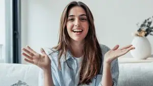 Head,Shot,Portrait,Smiling,Woman,Making,Video,Call,To,Friends