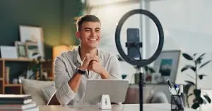 Man,,Influencer,And,Home,With,Smartphone,For,Social,Media,Or