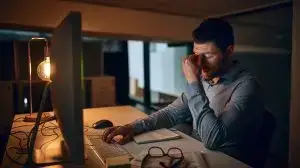 Stress,,Night,And,Business,Man,At,Desk,By,Computer,For