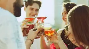 Golden,Light,Of,Sun,Enhances,Cheerful,Toast,Among,Friends,,Their