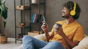 Young,Indian,Man,Wear,Casual,Clothes,Listen,To,Music,In