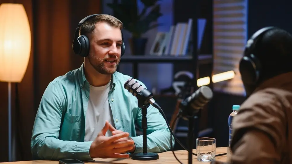 Podcasters,Enjoying,Happy,Conversations,With,Online,Listeners,In,Studio,,Covering