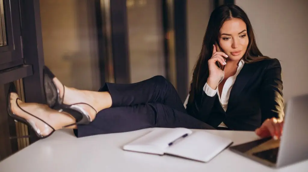 Graphic illustrating a successful woman who scaled her business