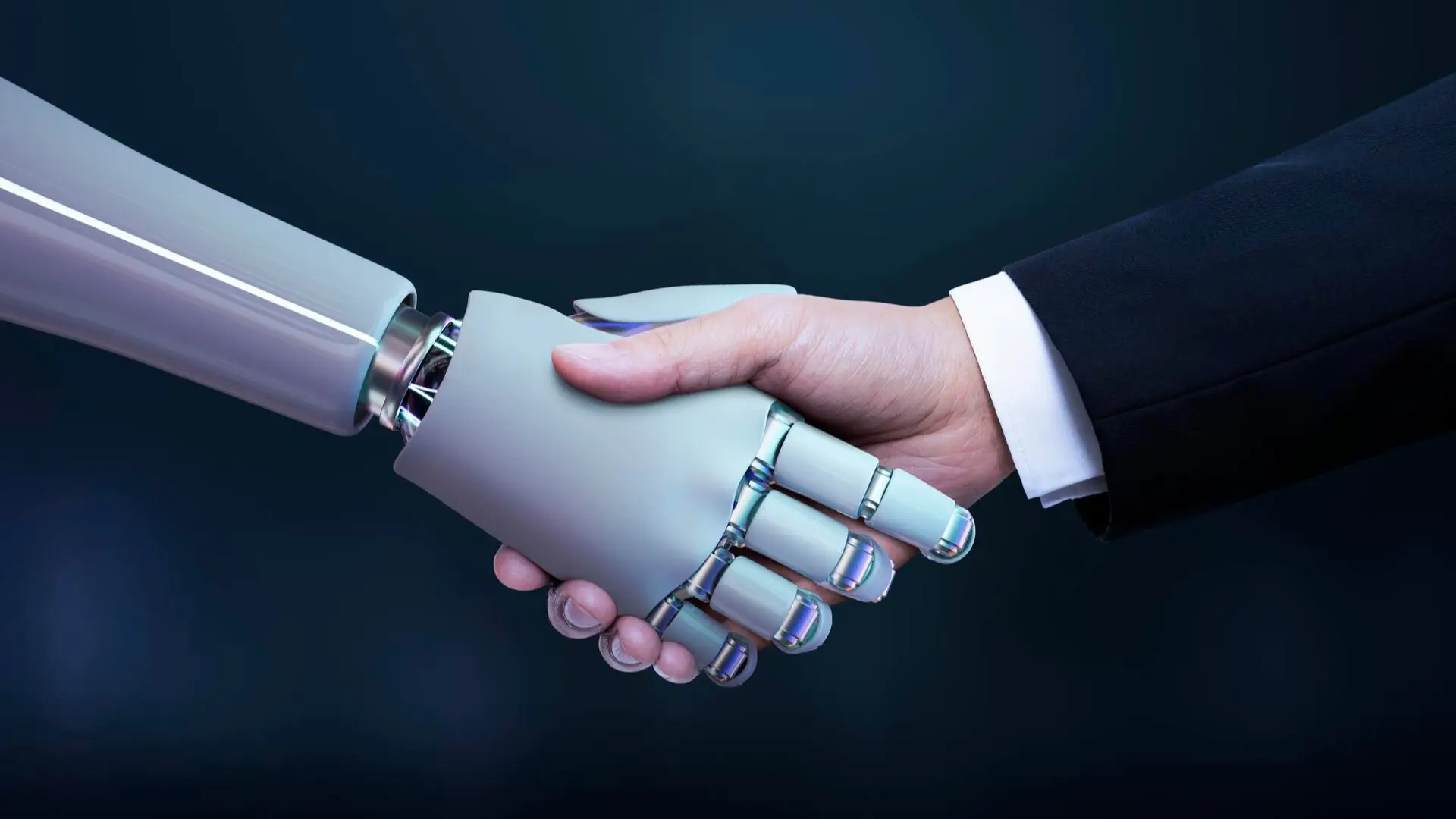 In this picture, a businessman is shaking hands with a robot, representing partnership.