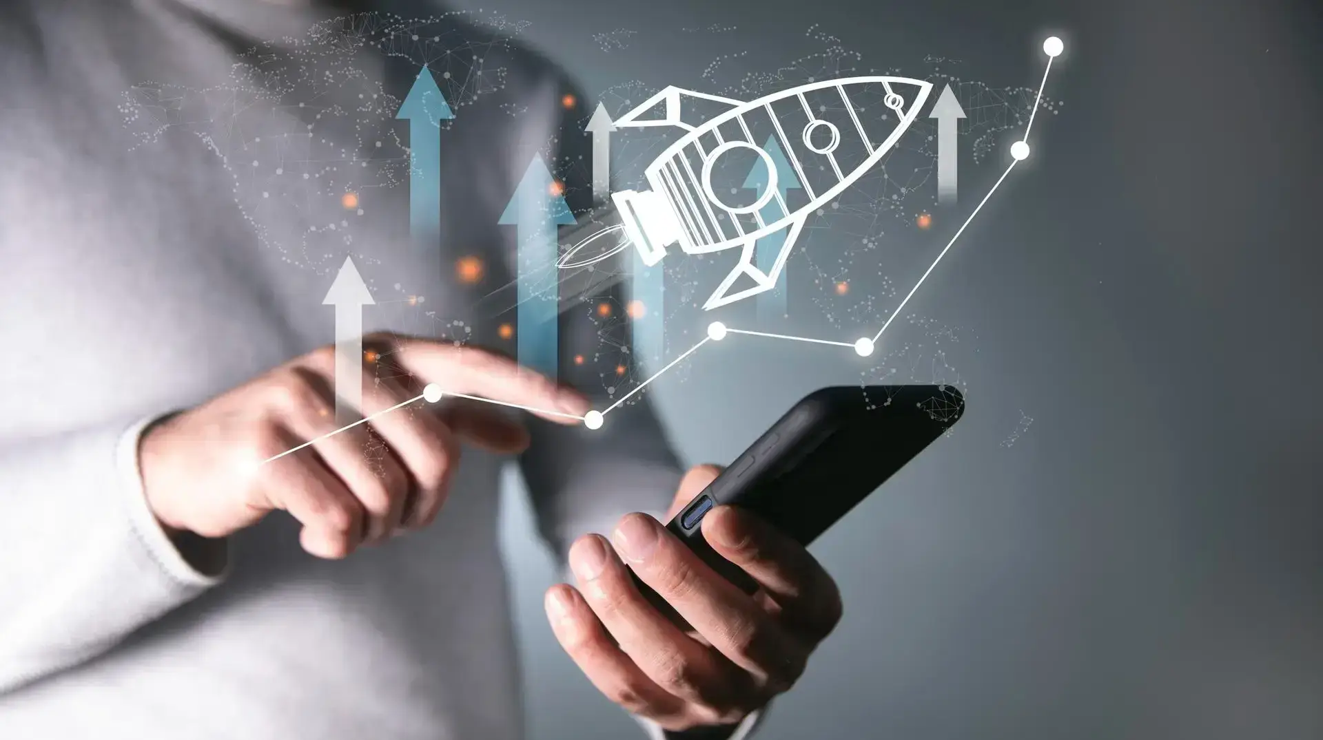 Entrepreneur launching a digital rocket ship from a smartphone to represent business scaling