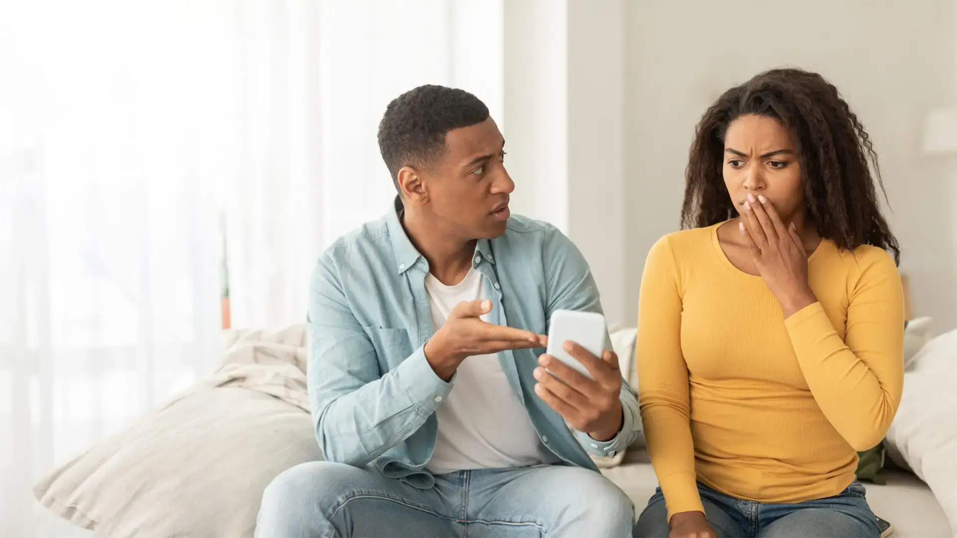 couple looking for tiktok trends on phone