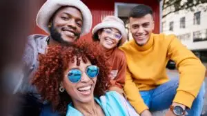 team of marketers laughing at a social media trend