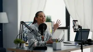 woman recording herself for a youtube video