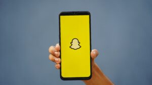 snapchat logo on a phone