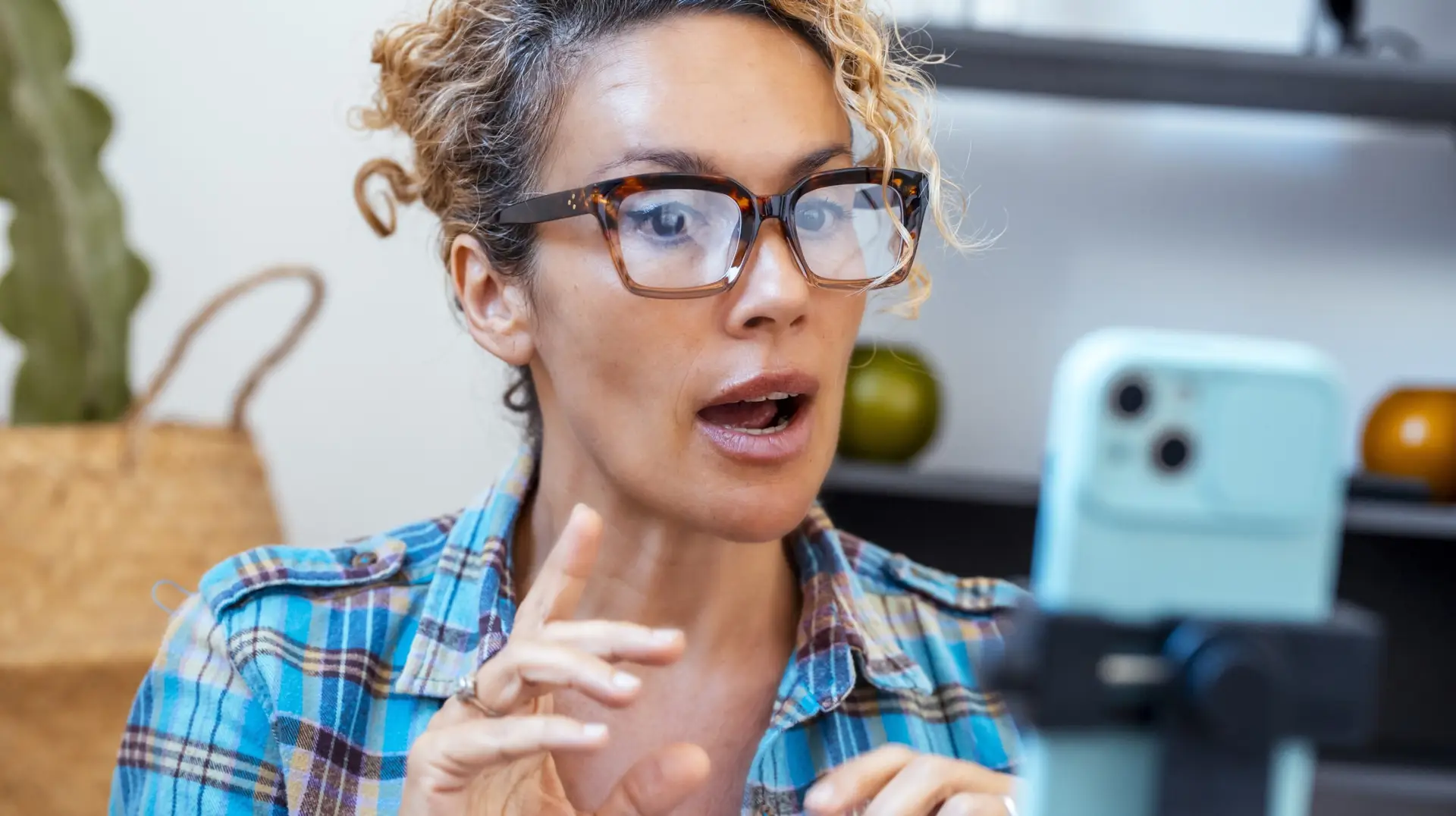 woman recording herself on a phone