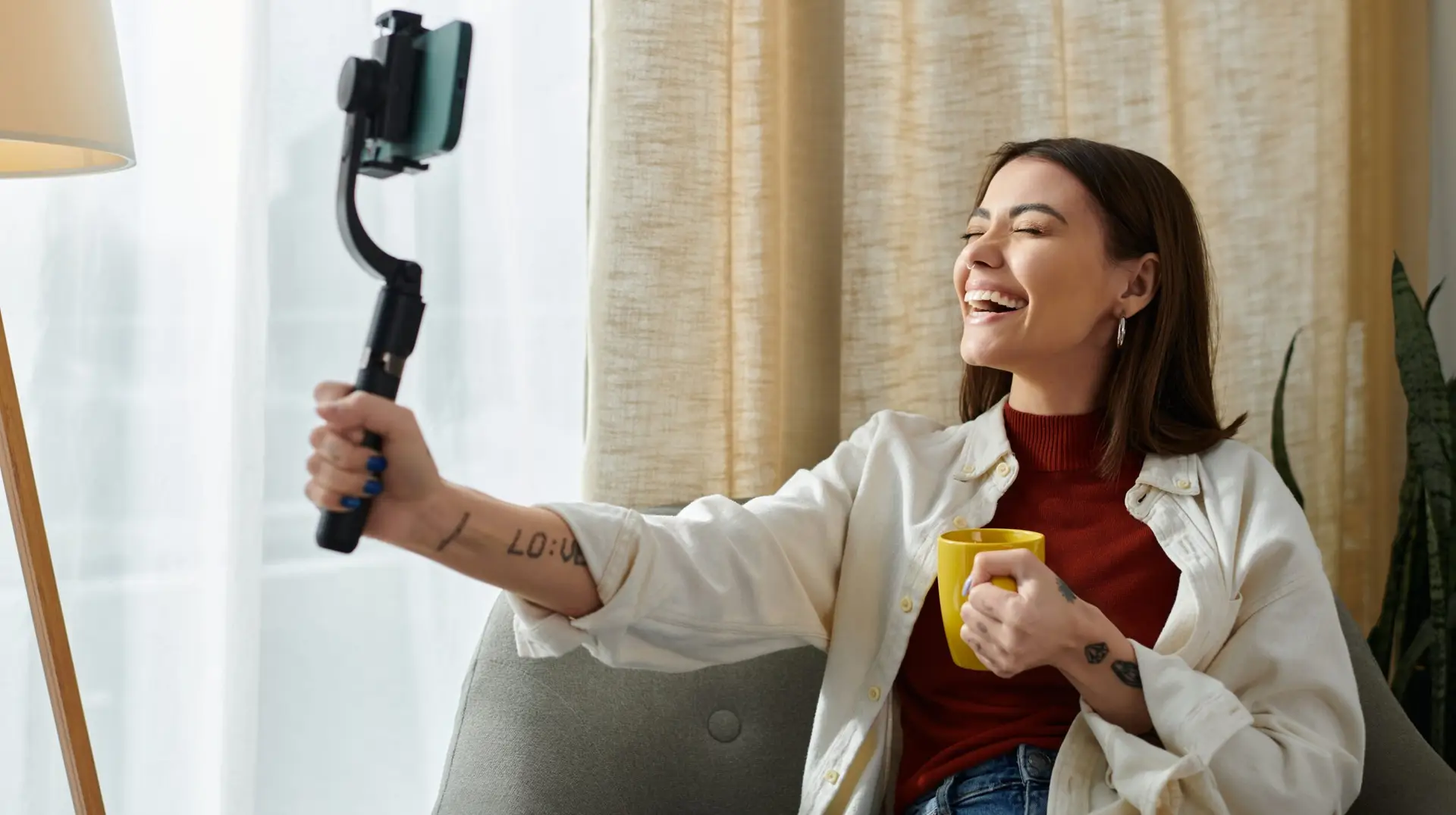 woman recording herself doing a tiktok trend