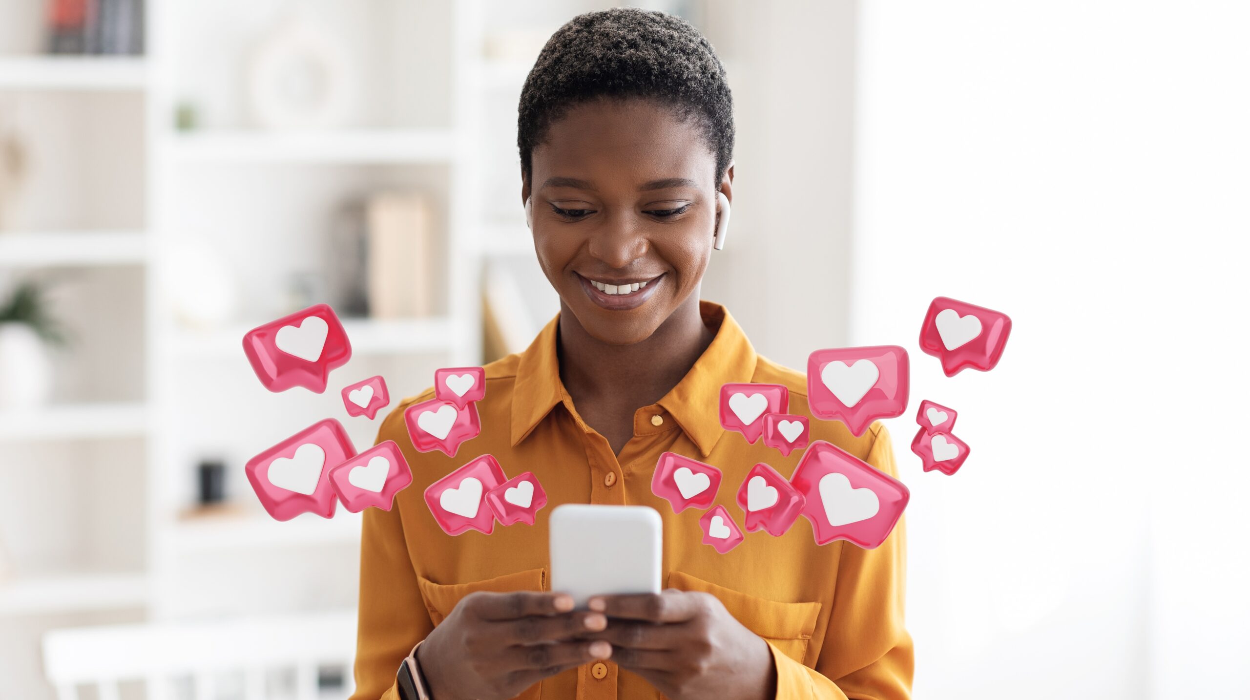 woman on her phone with likes coming out