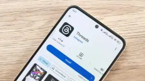 Threads app logo on a phone