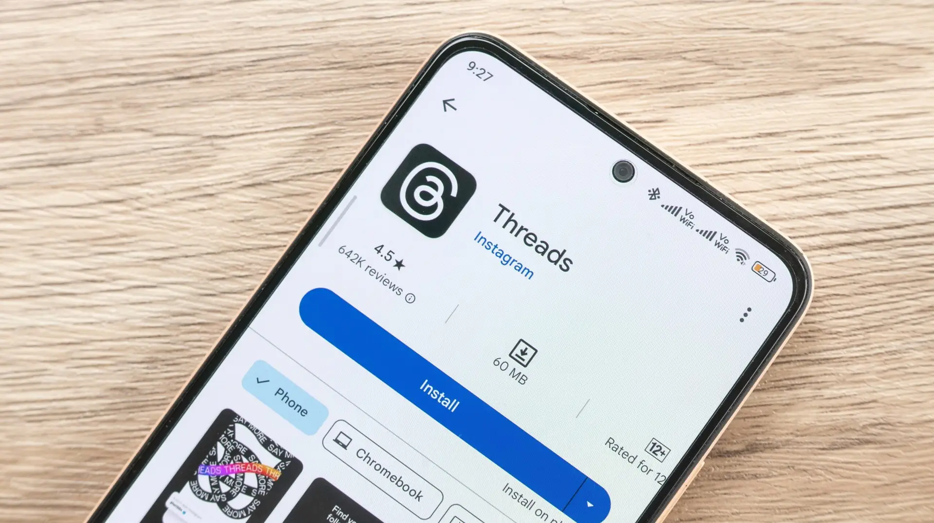 Threads app logo on a phone