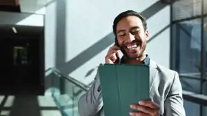 man working on his ipad