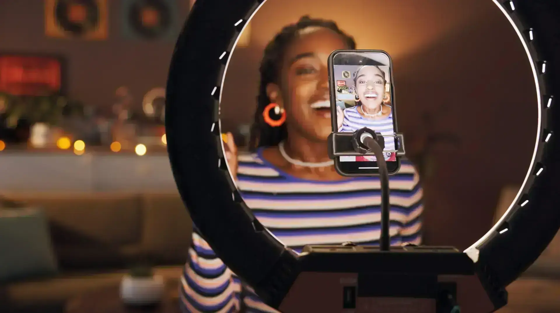 woman recording a viral tiktok trend video